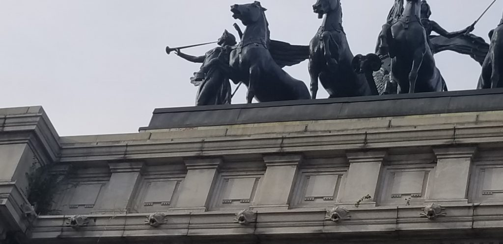 Close up of the Grand Army Plaza arch of the trumpeter and horses.
